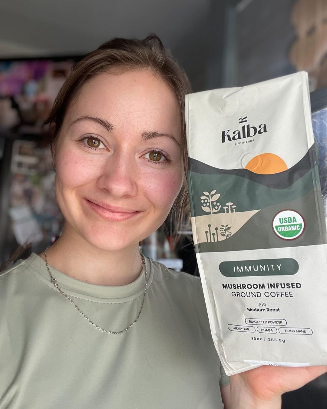 Kalba customer with Kalba coffee at home